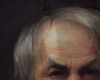 detail of oil painting in the process of being cleaned